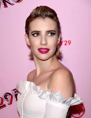 Close up of Emma Roberts with slicked back hair