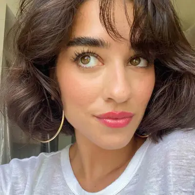 Person with bouncy bob