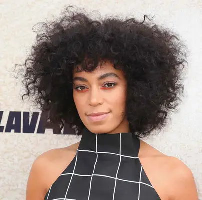 Solange with curly Afro