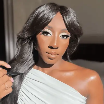 Ziwe wearing wide bangs