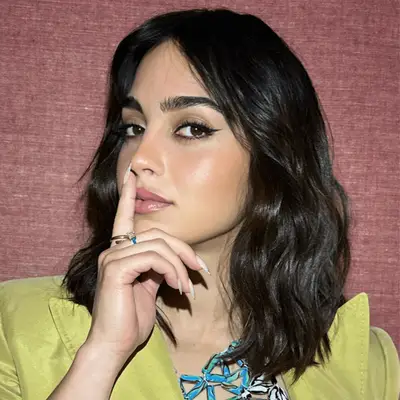 Melissa Barrera wearing a blunt bob and curtain bangs