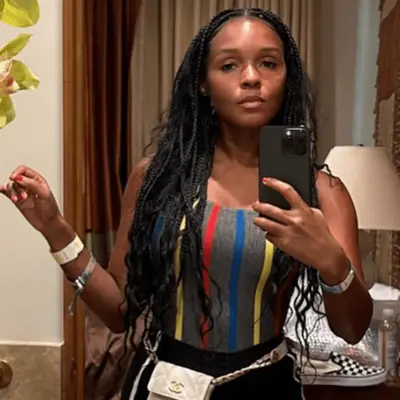 Janelle Monae wearing goddess braids