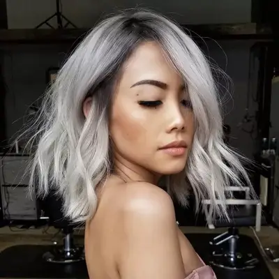 Woman with silver-blonde long bob hairstyle