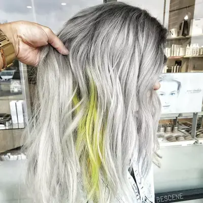 Silver-blonde hair with green underlay