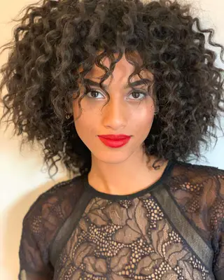 Curly natural bob with bangs