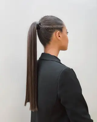 Sleek ponytail with braid detail