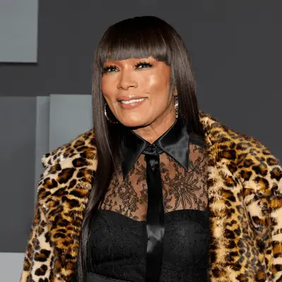 angela basset wearing straight hair with blunt bangs 