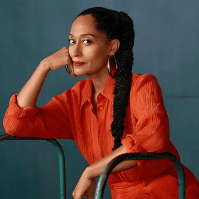 tracee ellis ross wearing ponytail with curly hair
