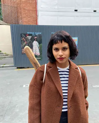 Zazie Beetz with a bob and micro bangs