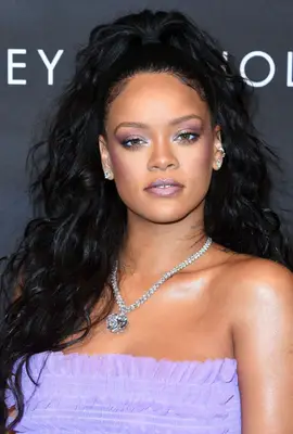 Rihanna with curly half-up hairstyle