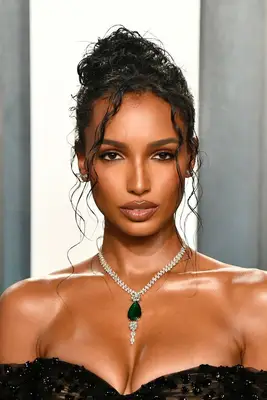 Jasmine Tookes with curly updo