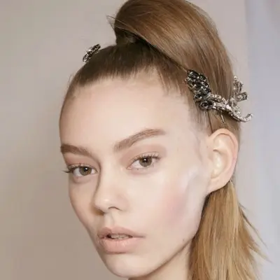 Architectural high ponytail with brooches