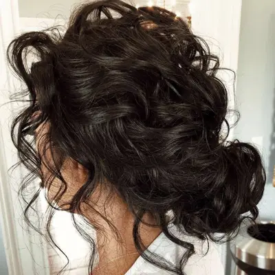 Curly low bun hairstyle