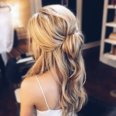 Half-up, half-down blonde hairstyle