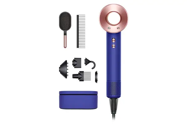 Blue and gold Dyson Supersonic Hair Dryer with attachments shown