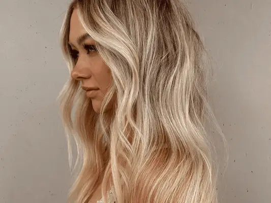 Close up of woman with bleached blonde hair