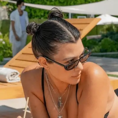 Kourtney Kardashian with space buns