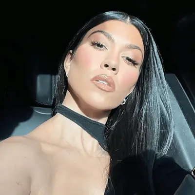 Kourtney Kardashian with sleek and shiny hair
