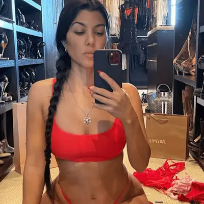 Kourtney Kardashian with long braid