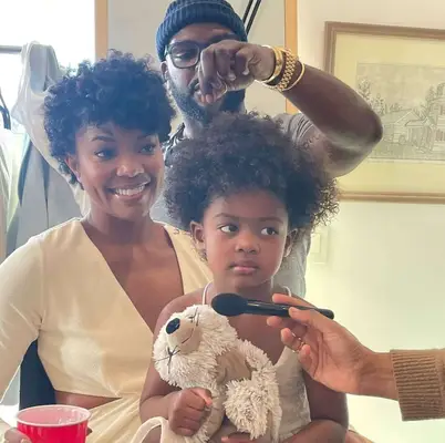 gabrielle union-wade and daughter kaavia wearing curly hair