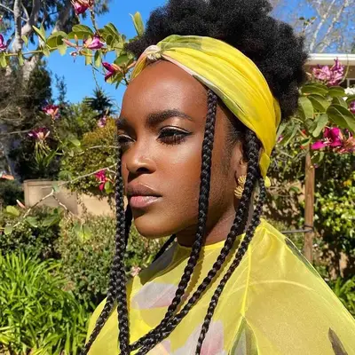 wunmi mosaku wearing natural hair and braids