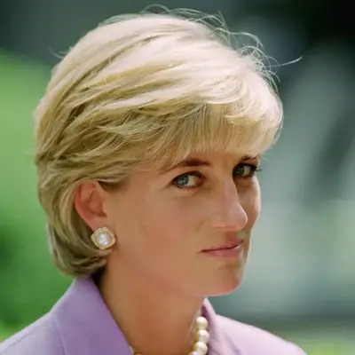 Princess Diana wears a smooth blowout with rounded ends