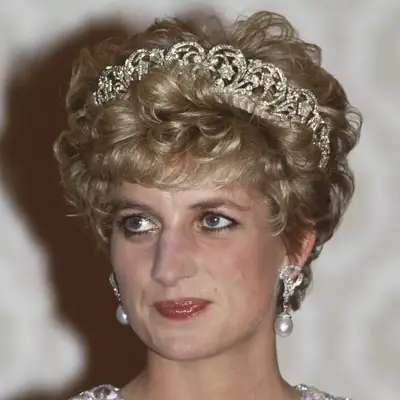Princess Diana wears the Spencer tiara on a bed of fluffy curls