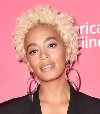 Solange curly blonde pixie