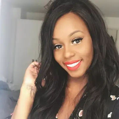 wearing a wig: Giselle La Pompe-Moore wearing a long straight wig