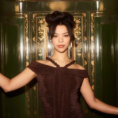 India Amarteifio with butterfly bangs