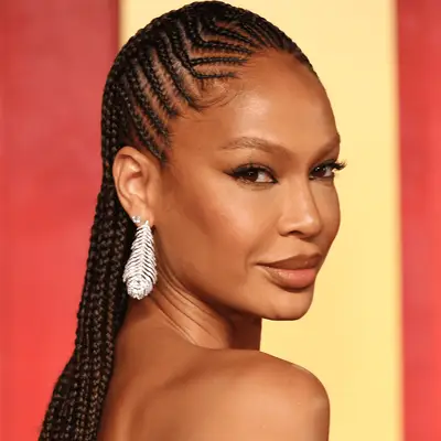 Joan Smalls wearing intricate cornrows