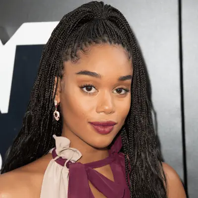 Laura Harrier wearing long micro braids hairstyle