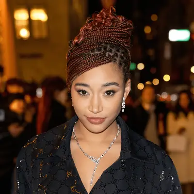 Amandla Stenberg wearing copper french curl braids 