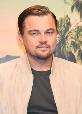 Leonardo DiCaprio with short sleek hair at the 