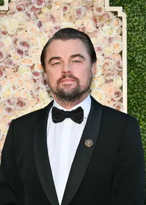 Leonardo DiCaprio with a deep opposite side part at the 2024 Golden Globe Awards in Beverly Hills