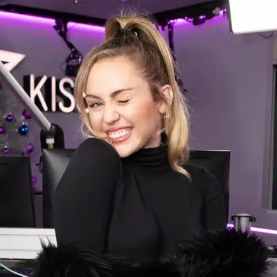 Miley Cyrus with high ponytail