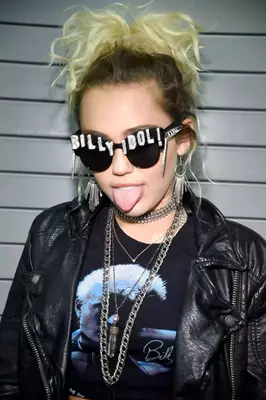 Miley Cyrus performs with Billy Idol at the 2016 iHeartRadio Festival