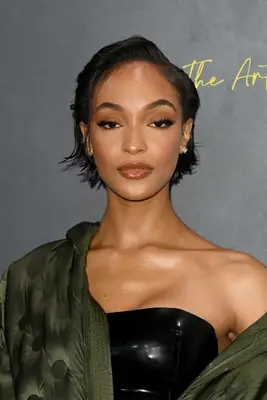 Jourdan Dunn with wet-look bixie haircut attends the Moncler Genius presentation during London Fashion Week