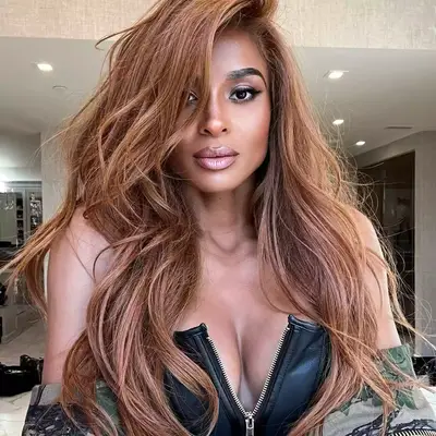 Jasmine Sanders with butter blonde hair