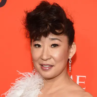 Sandra Oh with updo and bangs