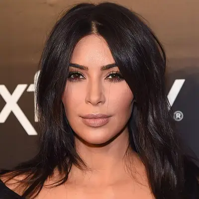 Kim Kardashian with layered haircut on oblong face