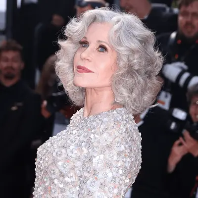 Tracee Ellis Ross smiling, portrait from profile angle