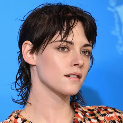 lizzo wearing a finger wave mullet hairstyle