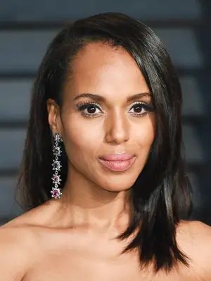 statement earrings hairstyles: Kerry Washington with low side parting