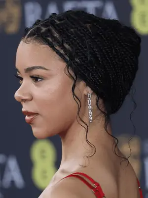  India Amarteifio in small boho braids with French roll