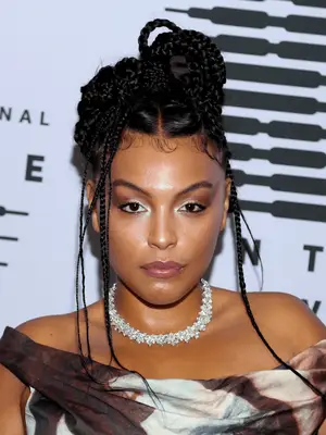 Paloma Elsesser in ponytail with loose individual braids