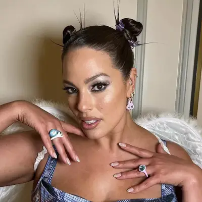 Adrienne Bailon Houghton in a gold barrette on straight smooth hair at the Academy Awards