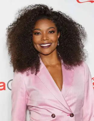 Close up of Gabrielle Union with natural brunette curls