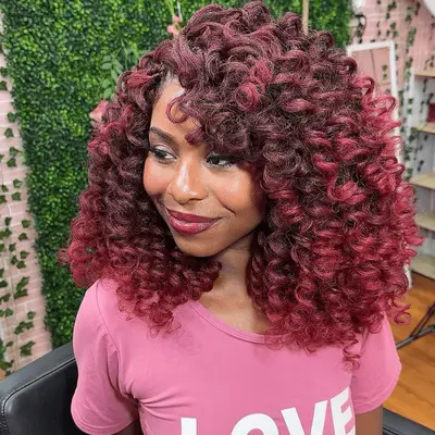 woman with burgundy crochet hair