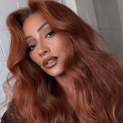 Shay Mitchell with auburn hair